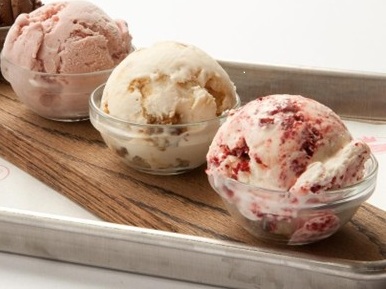Three scoops of assorted Broadway ice cream flavors
